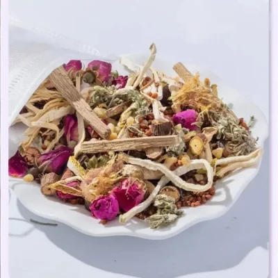 Natural herbal ingredients for sleep-inducing aromatherapy sachet with rose petals and calming botanicals